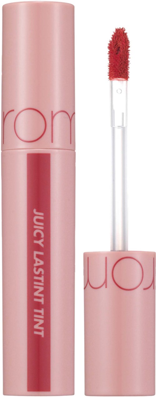 Pink lipstick tube with a clear wand showing red lipstick inside. Text says "JUICY LASTING TINT."