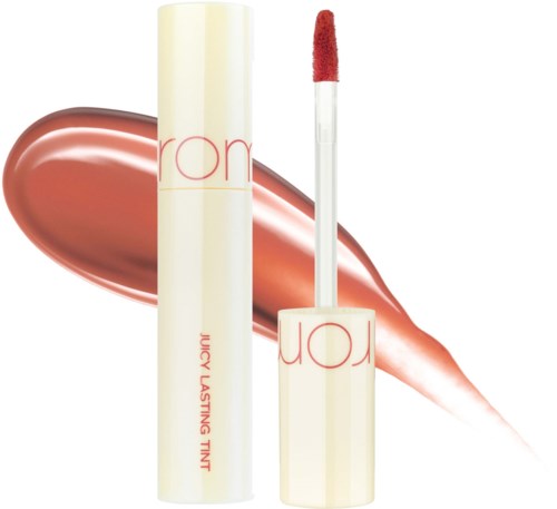 Lip gloss tube with a red applicator and a shiny, metallic rose-colored smear behind it.