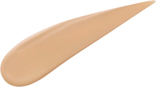 Beige meikkisieni, tippukalan muotoinen, pyöreä toiselta puolelta ja terävä toiselta.