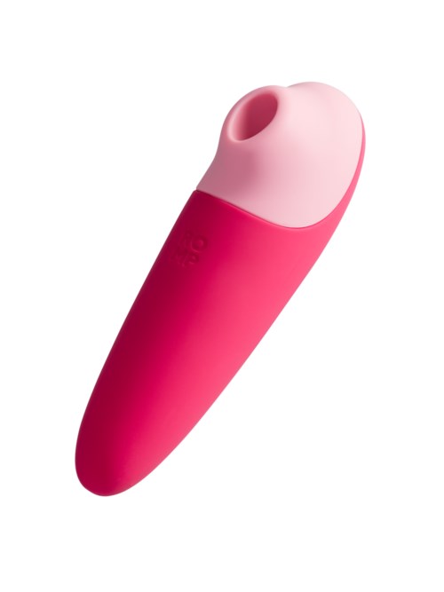 En liten rosa enhet med avrundet ende og et hull, sannsynligvis et personlig pleie- eller skjønnhetsverktøy.