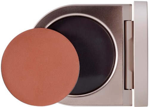 Ein kleines Make-up-Puder-Case mit einem runden Spiegel.