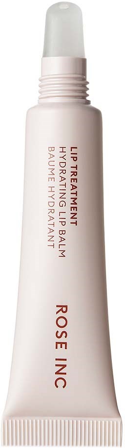 En hvit tube med leppebehandlingkrem med rød tekst. Den nevner hyaluronsyre-balm og hydrering, med lokk på toppen.