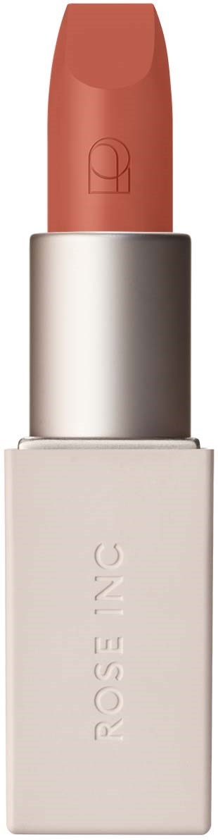 Ein rosafarbener Lippenstift in einem weißen Behälter mit silbernem Band.
