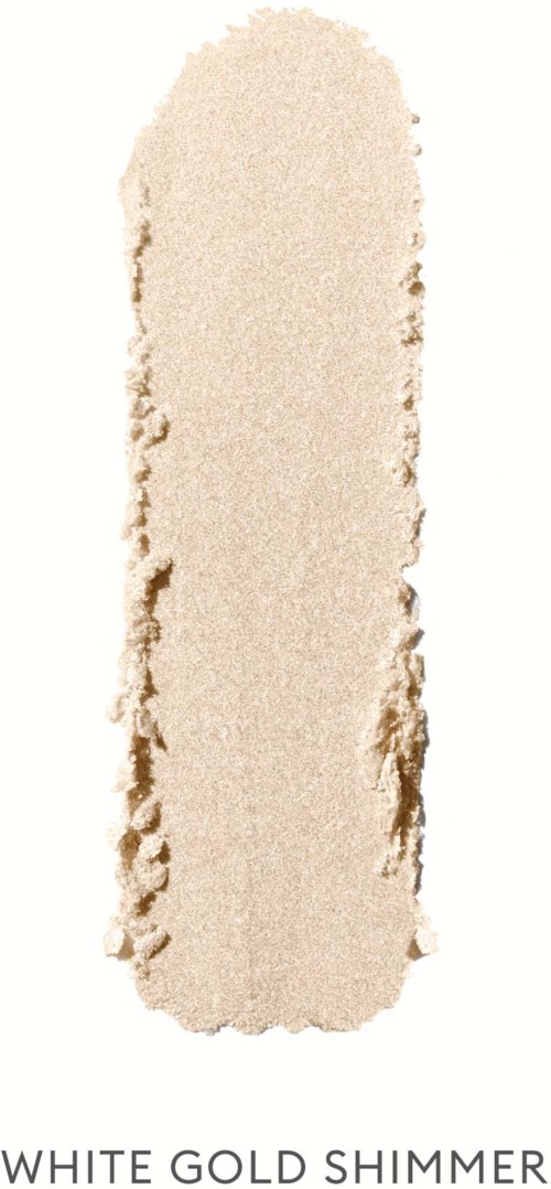 En vertikal stripe i lys beige eller sandfarge med ru kanter, merket "White Gold Shimmer" nederst.