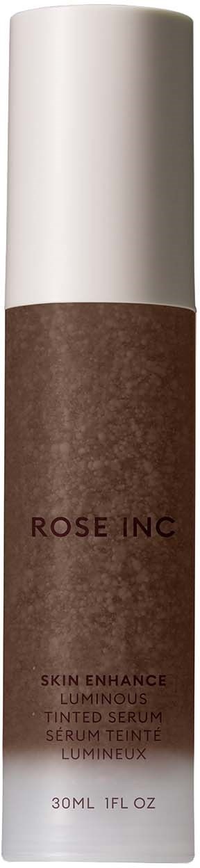 En bruntonad serumflaska med vit lock märkt 'ROSE INC' och produktinformation.