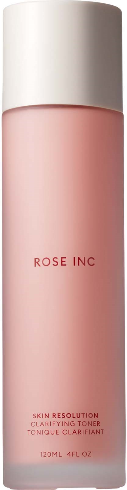 En lang rosa flaske med hvit kork, merket 'ROSE INC' og 'Skin Resolution Clarifying Toner.'