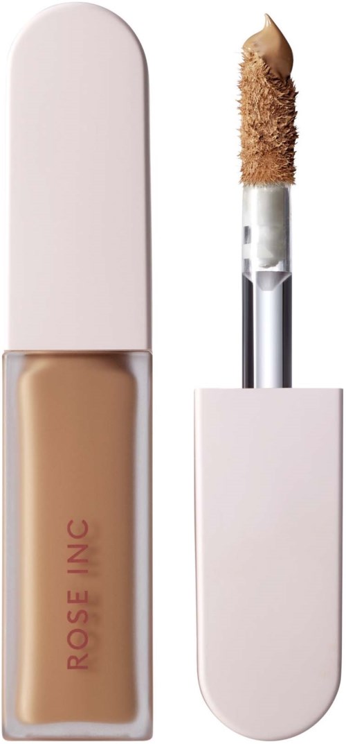 En nude flytande concealer med ambitionsborste i ett rosa fodral.