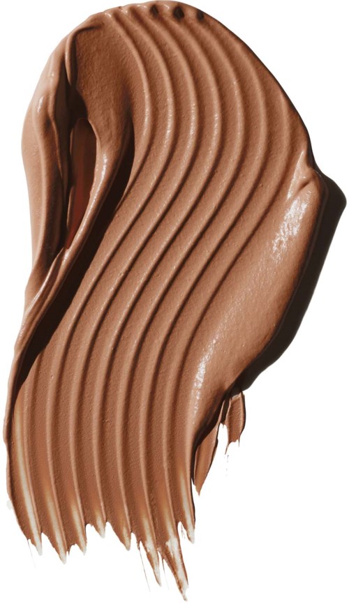 En slät, vågig remsa av mjölkchoklad med ränder.