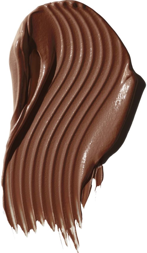 En slät, böjd spiral av mjölkchoklad med räfflor, visar en glansig, krämig yta.