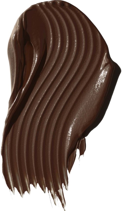 Ett stryk av mörk choklad med vågig textur, ser slätt och krämigt ut.