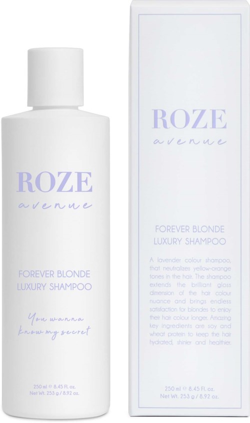 En hvid shampoeflaske og æske med lilla tekst, mærket 'Roze Avenue Forever Blonde Luxury Shampoo.'