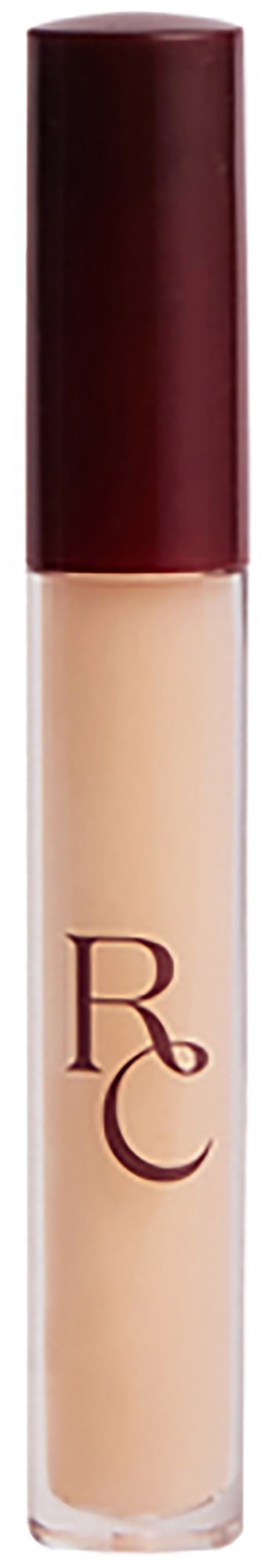 A beige liquid concealer in a clear tube with a maroon cap, marked with the letters 'RC'.