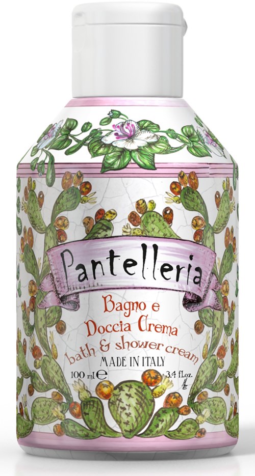 En lille flaske med hvid lås, dekoreret med grønne kaktusser og pink blomster, mærket "Antelleria" til bad- og brusecreme.