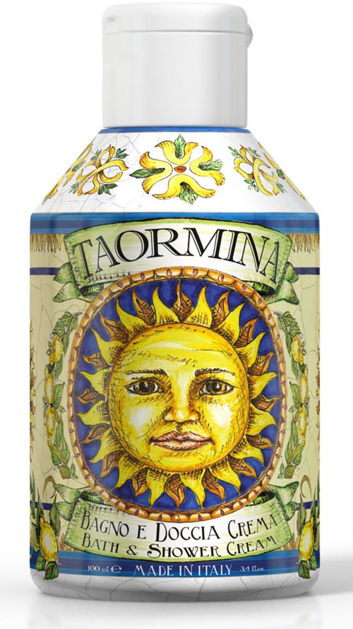Farverig flaske med sol- og ansigtsdesign, mærket "TAORMINA" og "Bad- og Shower Cream".