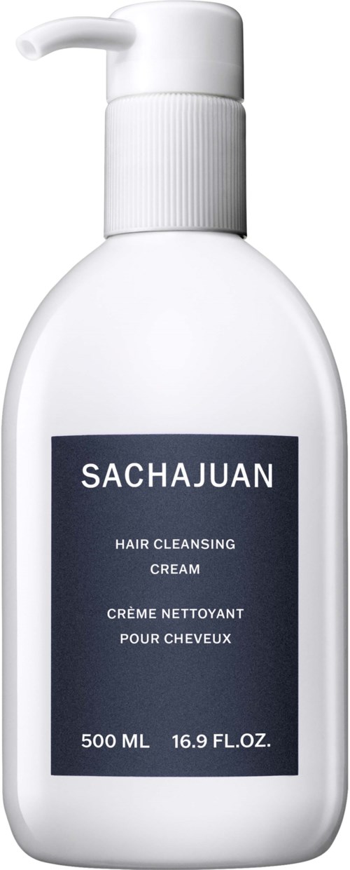 A white bottle with a pump contains Sachajuan hair cleansing cream, 500ml, labeled in blue.