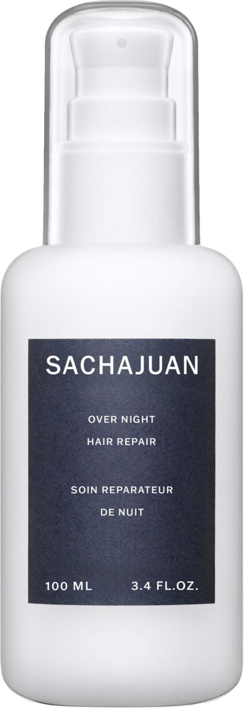 A white bottle labeled 'SACHAJUAN Over Night Hair Repair' with a pump, designed for hair care.