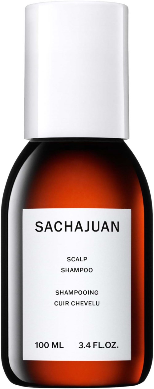 En liten bruna flaska med vit kork märkt Sacajuan Scalp Shampoo, 100 ml, för hårvård.