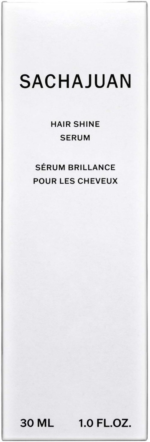 En vit box med svart text för Sachajuan hårglansserum, 30 ml, 1,0 fl oz. Enkel och ren design.