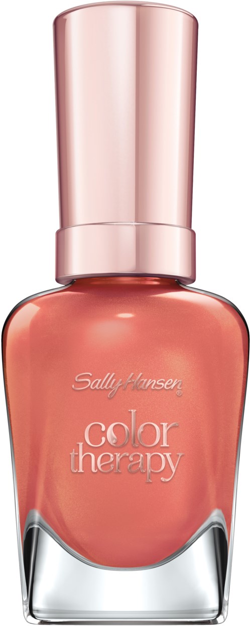 En persikfärgad nagellackflaska med ett glansigt, rosa lock och Sally Hansen Color Therapy-märke.