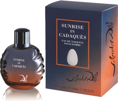 En mörk flaska med en blank kork bredvid en låda. Både lådan och flaskan säger 'Sunrise in Cadaqués' och 'eau de toilette'.