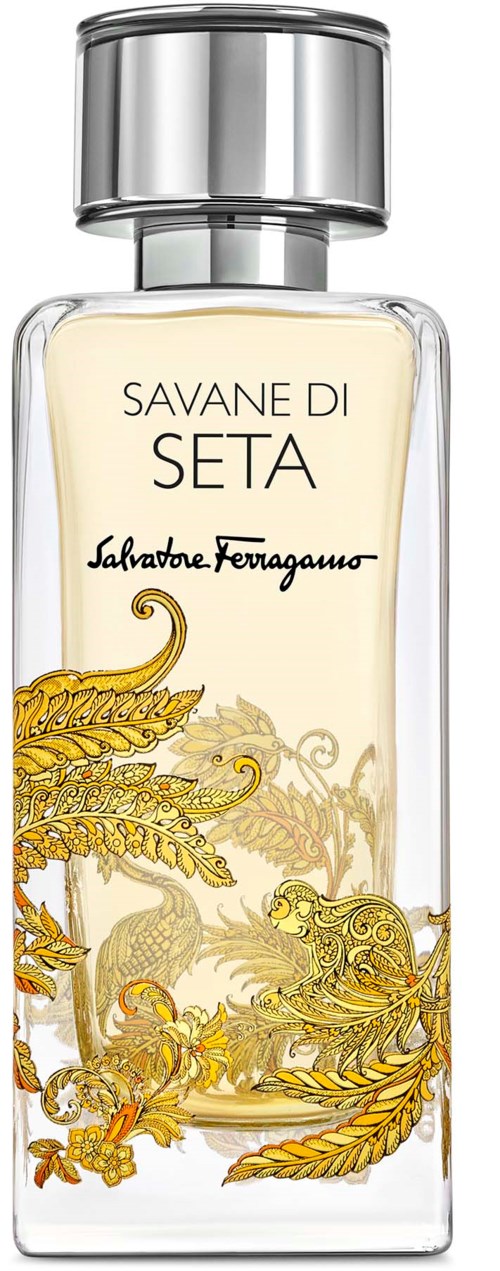 Klares Parfümflasche mit goldenen Blättern und Tieren, mit silberner Kappe. Das Etikett lautet Savane di Seta von Salvatore Ferragamo.
