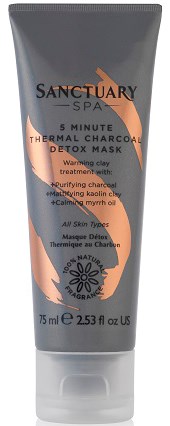 En tube med SPA detoxmaske med svarte, grå og orange farger, nevner kull, rensende ingredienser og Sanctuary-logoen.