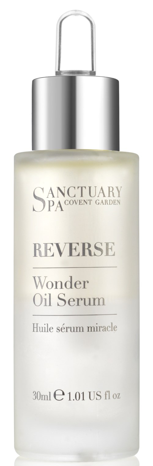 En liten flaske Wonder Oil Serum med pipette, merket Sanctuary Spa Reverse. Teksten beskriver produkt og størrelse.