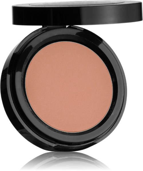 En liten ask med beige pressad puder och svart lock, används för smink eller ansikts puder.