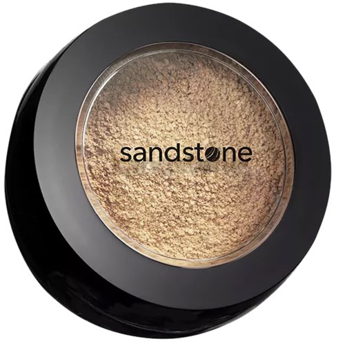 En rund behållare med beige pulver inuti och ordet "sandstone" på locket.