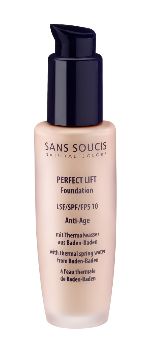 A bottle of foundation labeled Sans Soucis, with a pump and light pink liquid inside.