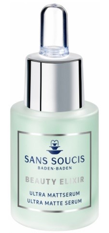 En liten flaska hudvårdsserum med silverpump, märkt 'Sans Soucis' och 'Beauty Elixir,' innehåller ultra matt serum.