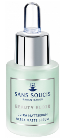 En liten flaska med droppering, märkt 'Sans Soucis Ultra Matte Serum,' ser transparent ut med en ljusgrön tint.