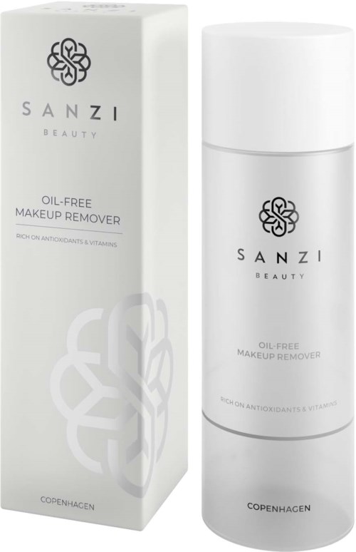 En vit flaska och förpackning för SANZI BEAUTY oljefri makeupremover, med svart blomma-logga, text om ingredienser och varumärkesnamn.