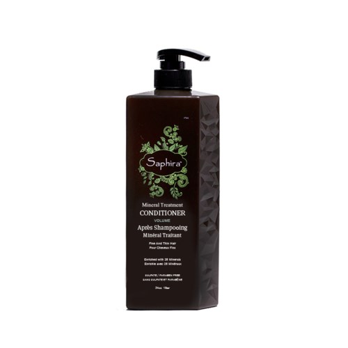 En brun sjampo-flaske med pumpe, merket 'Saphira Mineral Treatment Conditioner' for hårpleie.