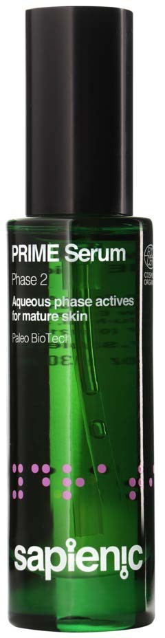 Green serum in a small black and green bottle, labeled 'Prime Serum' for skin care.