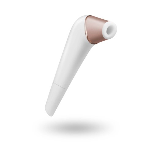 En vit och roséguldfärgad hörlur med en elegant design.