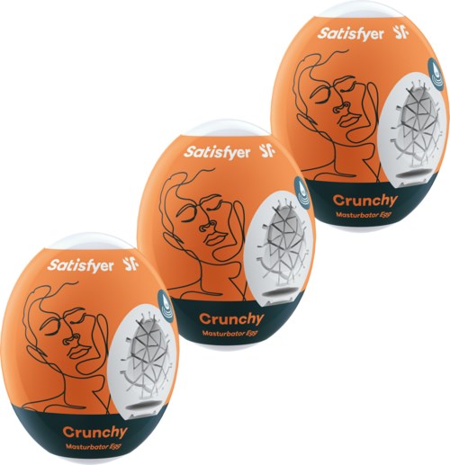 Twee oranje en zwarte verpakkingen met een lijntekening van een vrouwen gezicht en de woorden "Satisfyer" en "Crunchy."