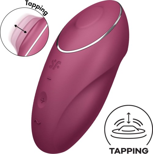 Lys lilla enhet med knapper og berøringsområde, laget for stimulering og tapping.