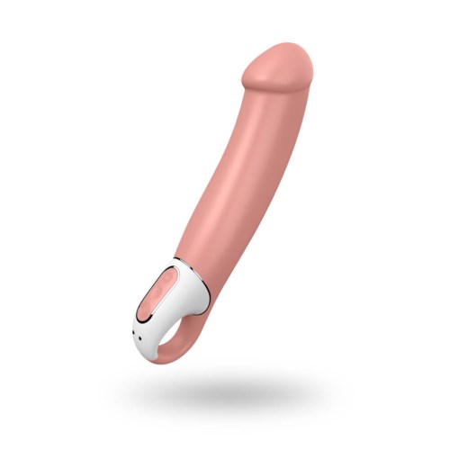 Ett rosa, böjt föremål med en vit bas, som liknar en massageapparat eller vibrator.