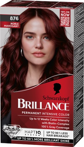 En kvinde med langt, bølget rødt hår på en hårfarveæske. Æsken har Schwarzkopf Brillance mærket og lover livligt, varigt farve.