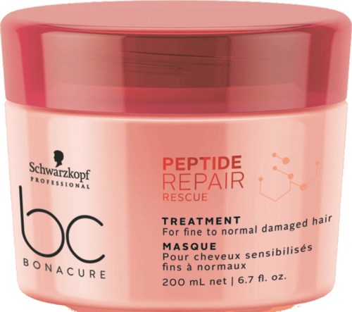 En rosa behållare med lock, märkt Schwarzkopf BC Bonacure Peptide Repair Rescue behandling för skadat hår.