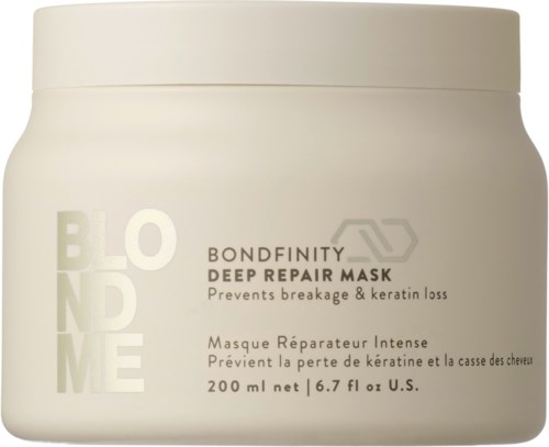 Valkoinen kiharamaskiastia nimeltä 'Bond Maintenance Deep Repair Mask', joka ehkäisee murtumia ja keratinin menetystä.