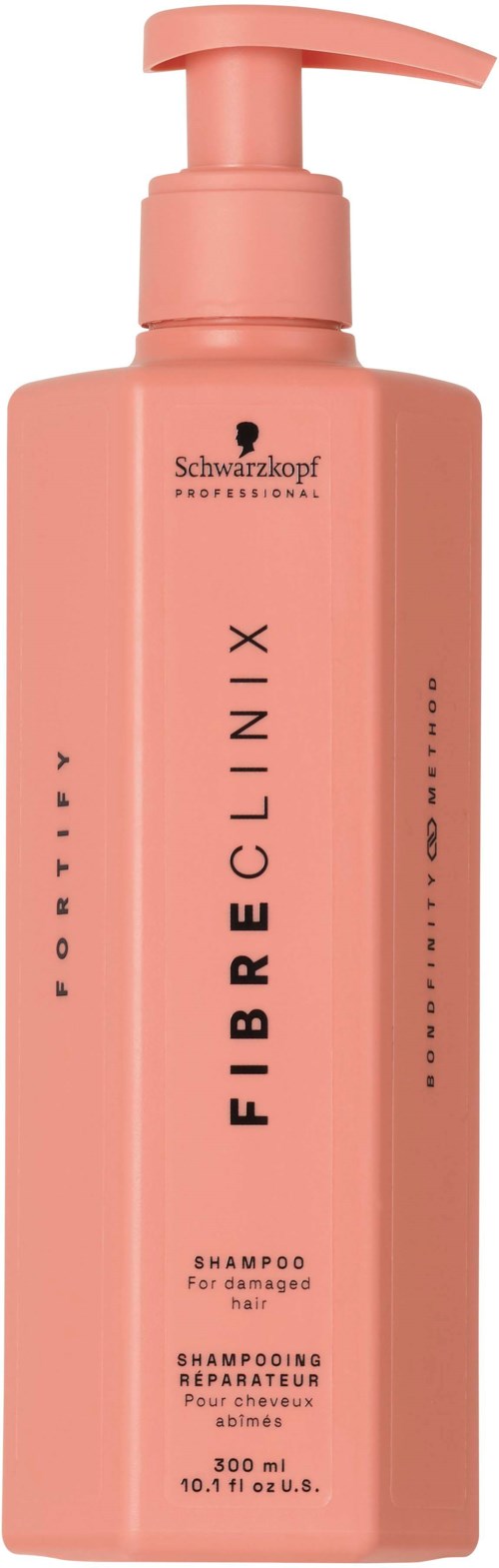 Rosa schampoflaska med pump, svart text, Schwarzkopf-märke och produktnamn Fibre Clinix. Den är för skadat hår.