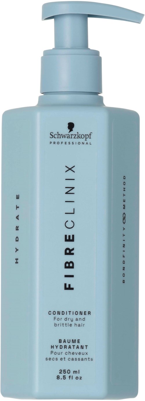 En ljusblå flaska med pump, märkt Schwarzkopf Fibre Clinix balsam för torrt och matt hår, 250 ml.