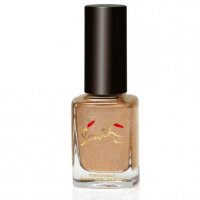 A nail polish bottle with beige-colored polish and a black cap.