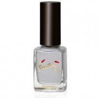 A clear nail polish bottle with a black cap. The bottle has a logo or design on it.