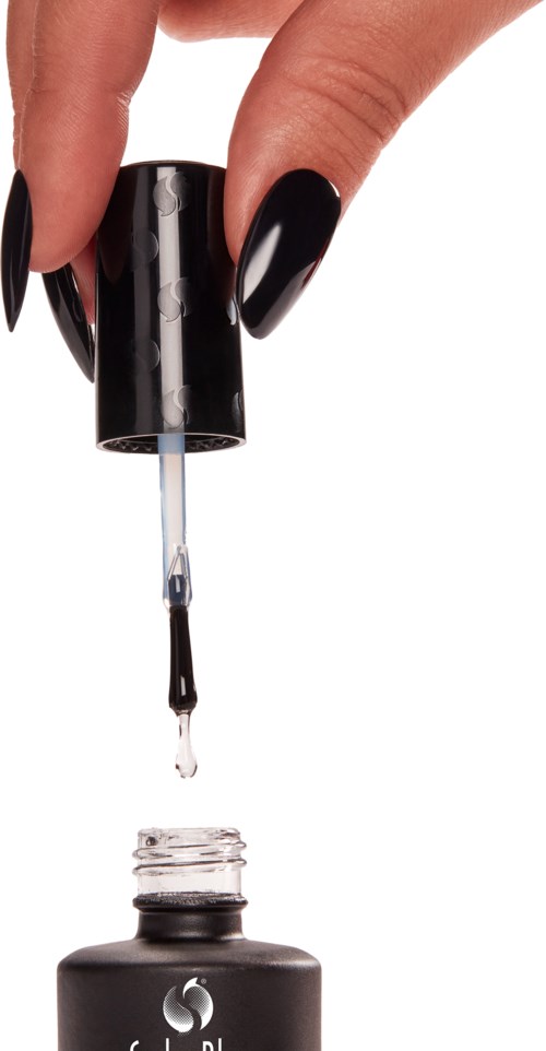 A hand with black nails dropper applying clear nail polish onto a bottle. Sonic logo is visible on the bottle.