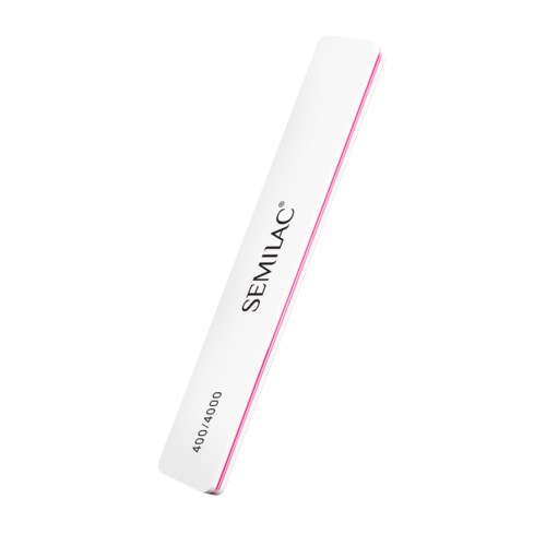 Ein weißes rechteckiges Objekt mit abgerundeten Kanten, beschriftet 'SEMILAC' und eine Nummer, wahrscheinlich ein Stift oder Kosmetikprodukt.