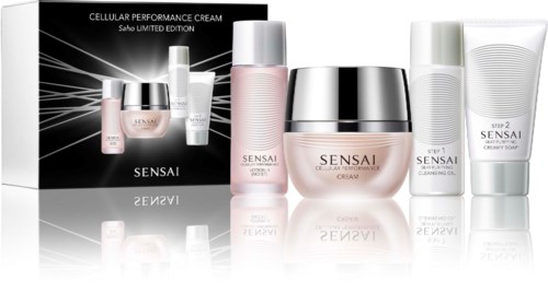 Et utvalg av hudpleieprodukter i flasker og krukker, med en svart eske merket 'Cellular Performance Cream' og 'SENSAI'.