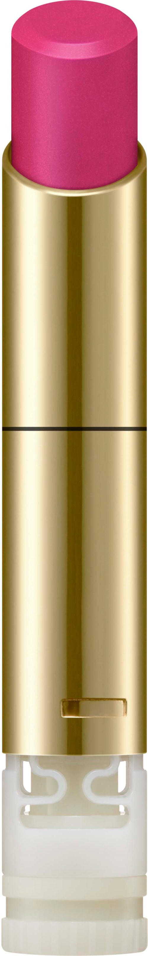 Ein rosa Lippenstift in einem goldfarbenen Röhrchen mit klarem Boden. Der Lippenstift ist leicht herausgeschoben.